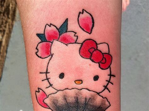 25 Pretty Hello Kitty Bow Tattoo Designs Slodive Hello Kitty Bow