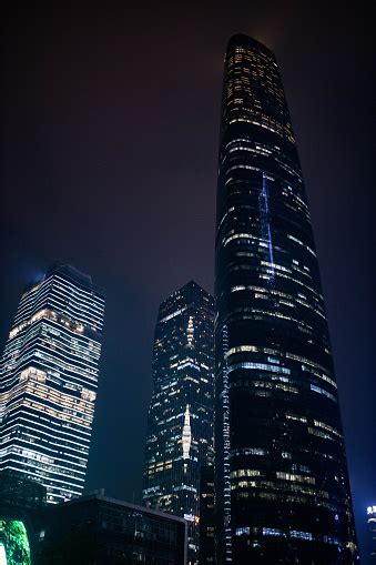 Glowing Skyscrapers At Night In Guangzhou Stock Photo Download Image