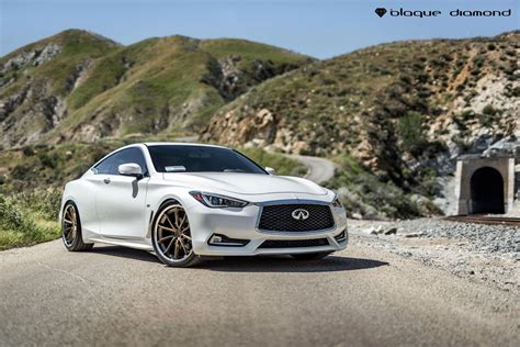 Captivating Infiniti Q60 With White Exterior Color And Bronze Rims