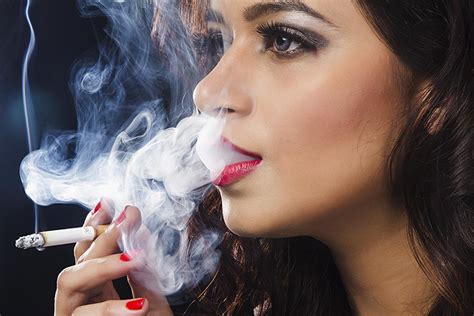 Indian Glamorous Young Beautiful Latin Woman Smoking Cigarette Smoke