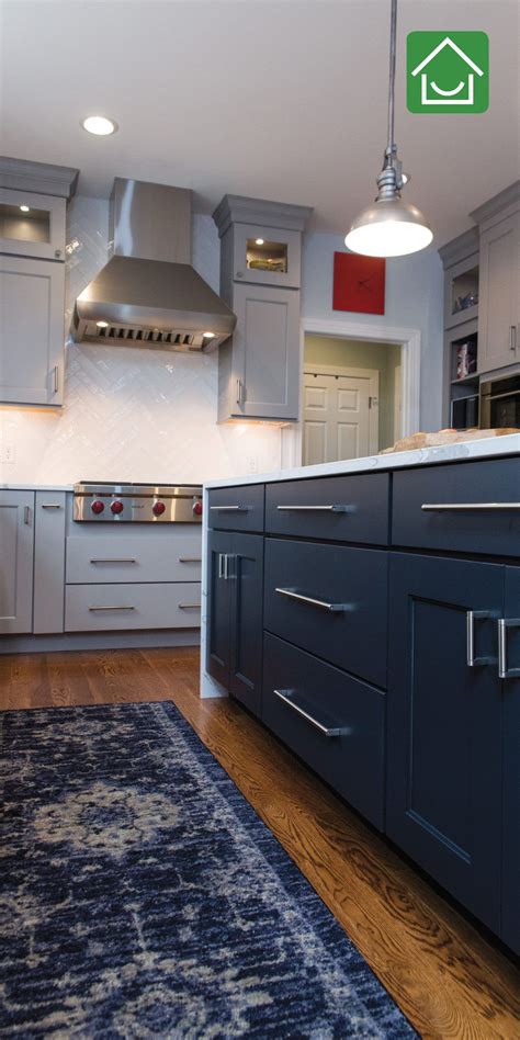 Clean lines and the ability to coordinate with nearly any home makes them a very attractive option. Navy Kitchen Island with Grey Cabinets#cabinets #grey # ...