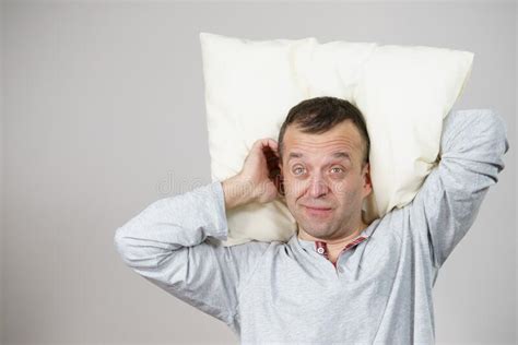 Man Sleepy Tired With Pillow On Grey Stock Photo Image Of Health