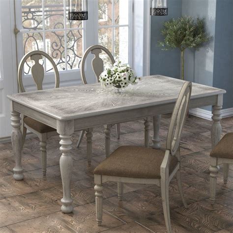 It offers the comfort of the classic features while leaving room for new elements as fashion trends—or your tastes—change. Bloomingdale Transitional Dining Table in 2020 ...