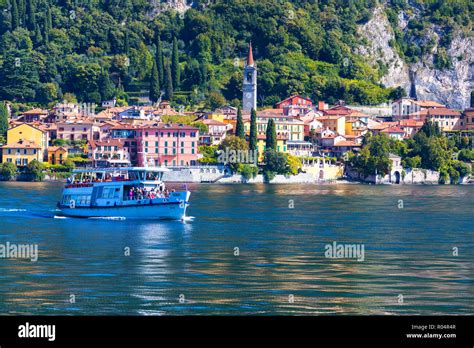 People On Boat Trip Around The Village Of Varenna Lake Como Lecco