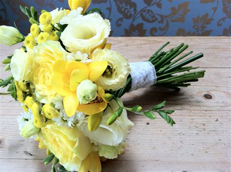 These boutonnieres of plum, dusty purple, and cranberry roses with vibrant greenery completely nailed the aesthetic. Flower School - Yellow Wedding Flowers with Campbell's ...