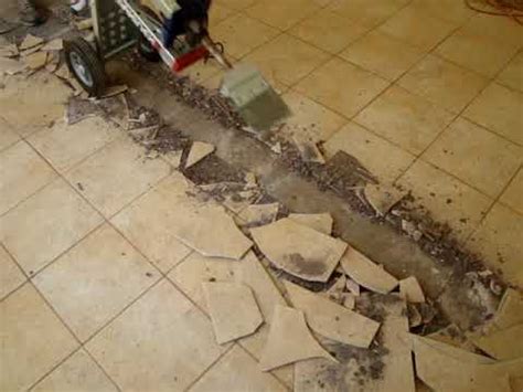 Tile sits there smugly how do you know which ones you should pick up or use? Makinex Jack Hammer Trolley - Removing Tiles and Mortar ...