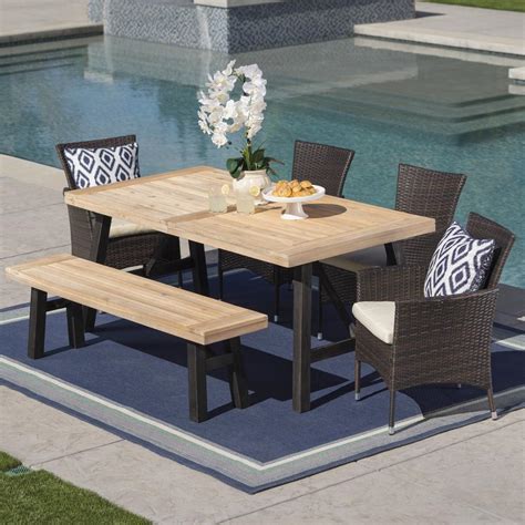 Shop our best selection of patio dining sets to reflect your style and inspire your outdoor space. Noble House 6-Piece Wicker, Wood and Iron Rectangular Outdoor Dining Set with Beige Cushion ...