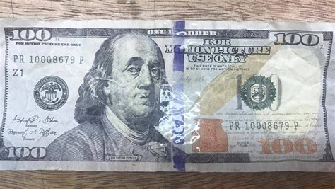 Police: Counterfeit $100 bill used at Asan store