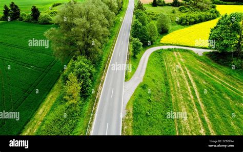 Aerial View Of Road Between Fields Stock Photo Alamy