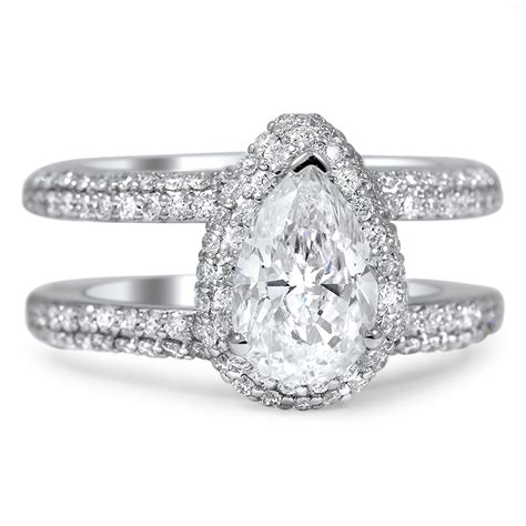 When deciding on an engagement ring setting, think about your budget , lifestyle and design preferences to make sure you and your sparkler are a perfect match. Custom Double Band Pavé Halo Diamond Ring | Brilliant Earth