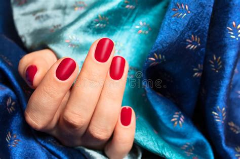 Red Nails And Blue Silk Stock Photo Image Of Caucasian 74854282