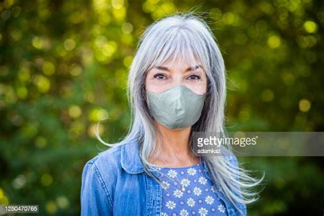 older woman face mask photos and premium high res pictures getty images