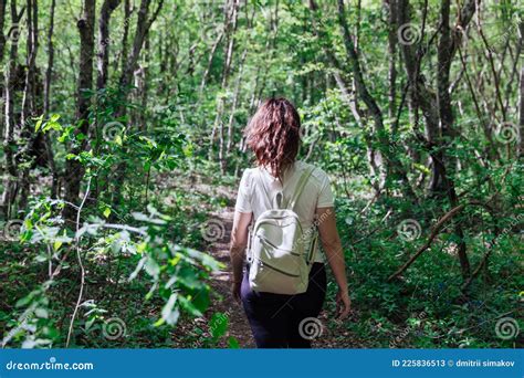 Woman Walking Down The Road In A Green Forest Travel Hike Stock Image Image Of People Outdoor