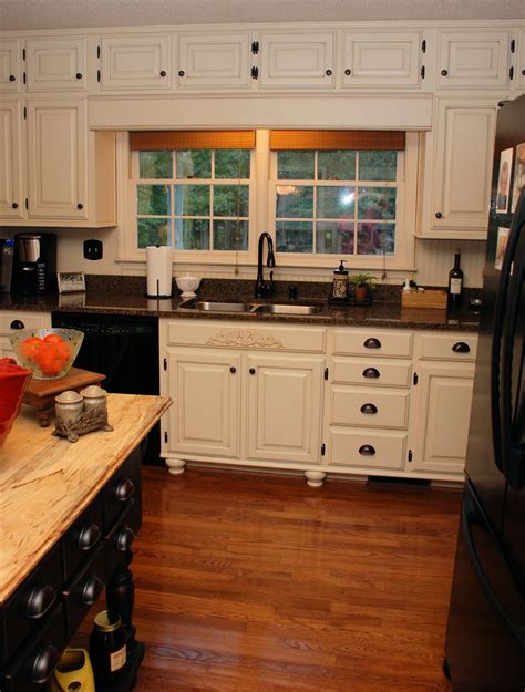 Restaining kitchen cabinets staining oak cabinets light oak cabinets honey oak cabinets kitchen cabinets decor wood tile kitchen light grey kitchens paint for kitchen walls kitchen flooring. Remodelaholic | From Oak Kitchen Cabinets to Painted White ...