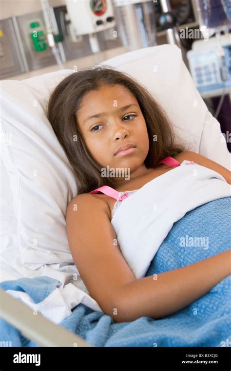 Teen Lying In Hospital Bed