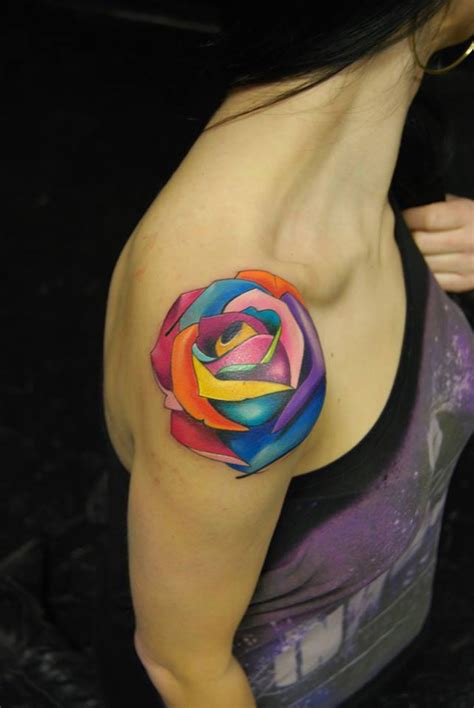 Tribal designs look great with rose tattoos. Multicolored Rose Tattoo | Best tattoo design ideas