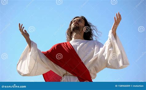 Jesus Raising Hands To Sky And Praying Resurrection And Ascension Of