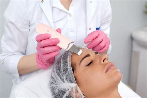 Beautiful Woman Receiving Ultrasound Cavitation Facial Peeling