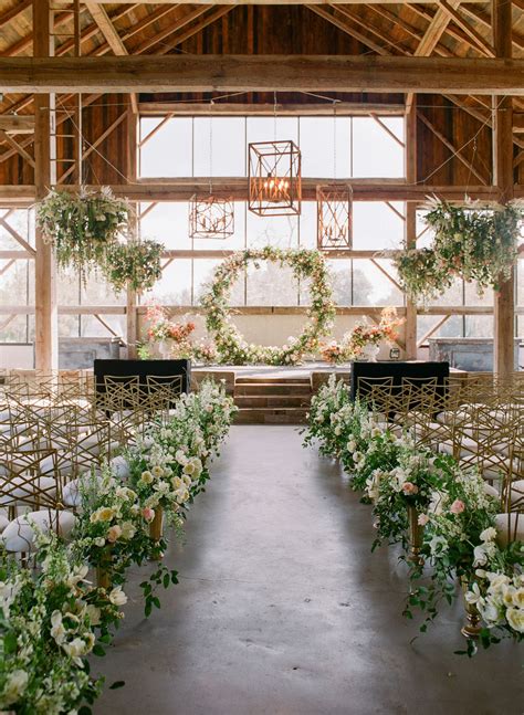 kiana underwood of tulipina turned this rustic ceremony venue into a floral fantasy with a