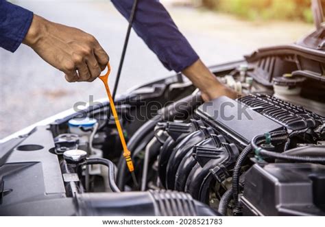 Car Care Maintenance Servicing Closeup Hand Stock Photo 2028521783