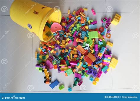 A Bucket Of Scattered Legos On The Floor Stock Photo Image Of Vibrant