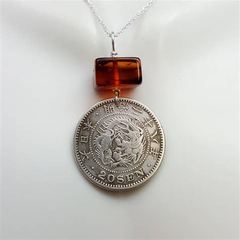 The world will soon know about it. Japan necklace - 1895 Silver Dragon coin necklace ...