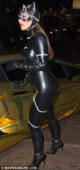 Kim Kardashian Dresses As A Very Seductive Catwoman As She Arrives At Halloween Party With A