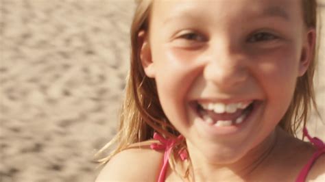 slow motion of girl twirling around on beach stock footage sbv 300509180 storyblocks