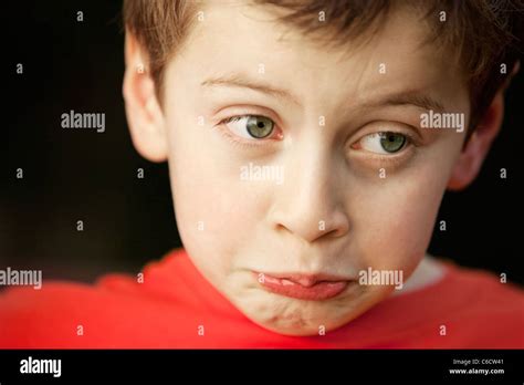 Pouting Caucasian Boy Stock Photo Alamy