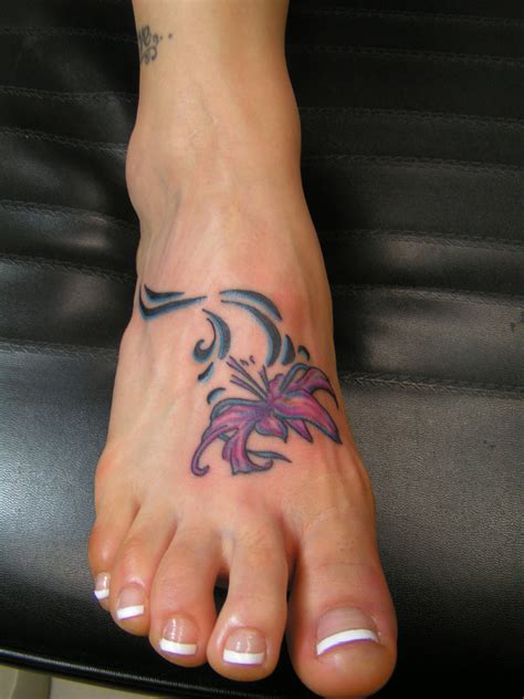 Click for more flower tattoos. Flower Foot Tattoo Picture