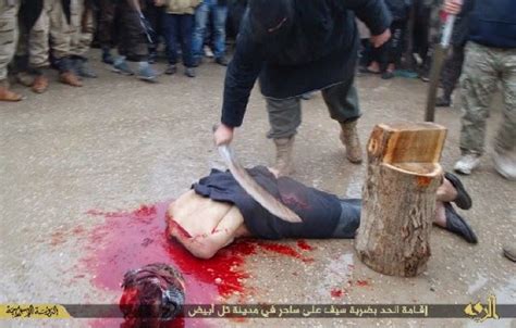 Isis Beheads Elderly Man Accused Of Witchcraft Gore Image