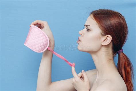 Woman Examining Pink Sleep Mask Naked Shoulders Blue Background Stock Image Image Of Rest