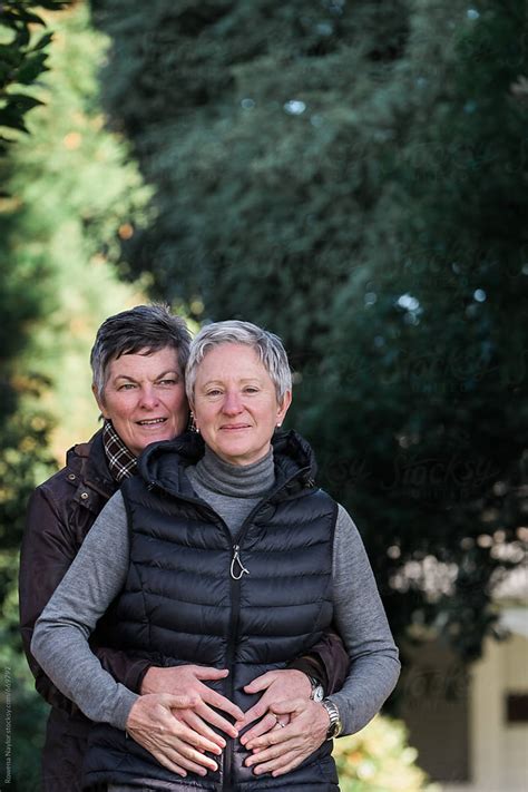 Mature Lesbian Couple Embracing Del Colaborador De Stocksy Rowena