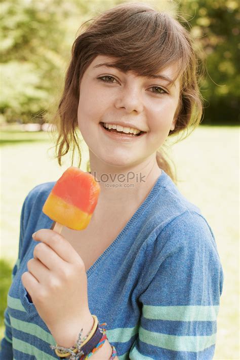 Girl Eating Popsicle In The Park Picture And HD Photos Free Download On Lovepik