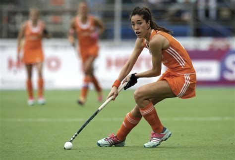 Hockey is a sport in which two teams play against each other by trying to manoeuvre a ball or a puck into the opponent's goal using a hockey stick. Naomi van As - Hockey.nl
