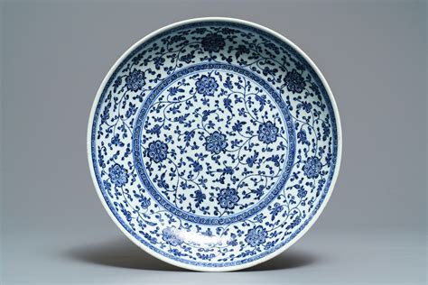 A Chinese Ming Style Blue And White Floral Scroll Dish Qianlong