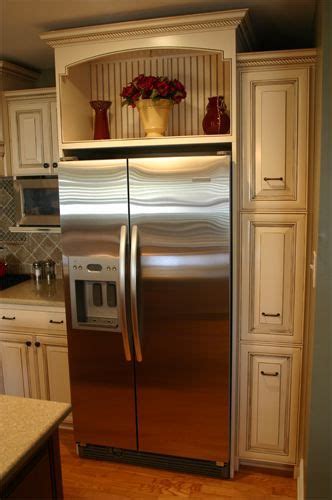 New or revamped kitchen cabinets and shelves can make a shabby looking kitchen look shabby chic. above fridge cabinet ideas - Google Search | Kitchen ...