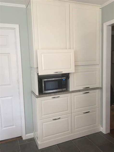 We dare to say that our tall kitchen cabinets, with their range of heights, widths, depths and colors, fits in much any kitchen. Brilliant idea for hidden but easily accessible microwave! Ikea cabinet - on its side with ...