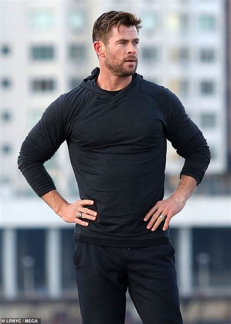 Chris Hemsworth Flaunts Rippling Muscles In Skin Tight Black Jumper In