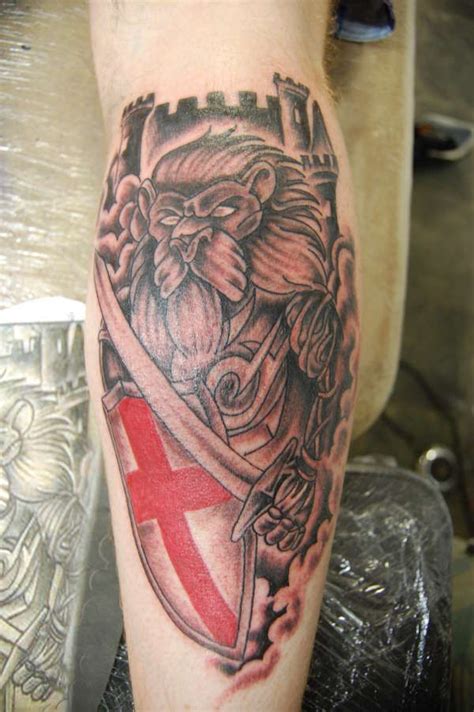The placement of the design is critical and has a way of expressing at a deeper level the meanings associated with the design. Lion & England | England tattoo