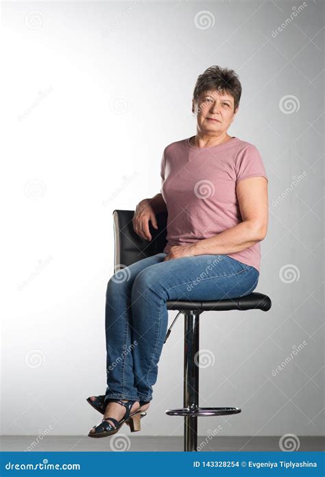 Elderly Woman Sitting On A Chair Stock Photo Image Of Wheelchair