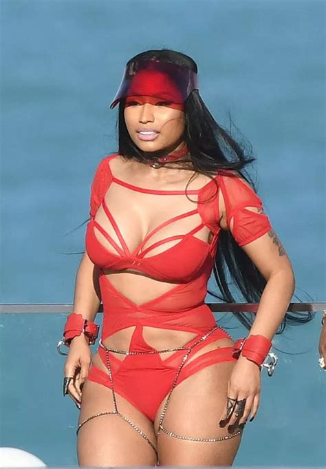 Nicki Minaj Flaunts Unreal Curves In Red Cutout Swimsuit As She Films Music Video With Rapper