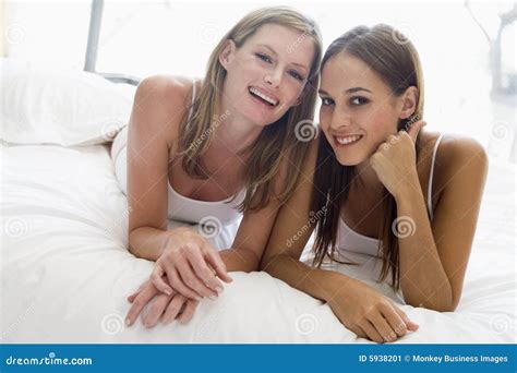Two Women Lying In Bed Stock Image Image 5938201
