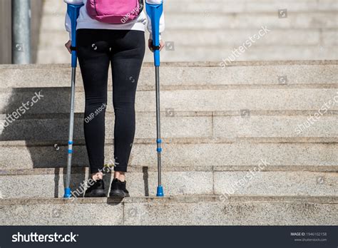 Girl On Crutches Back Going Stairs Stock Photo 1946102158 Shutterstock