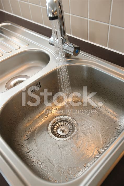 Kitchen Sink With Running Water Stock Photo Royalty Free Freeimages