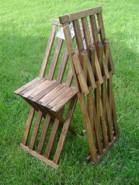 Wood folding chair comfortably curved back high quality construction supportive braces provide extra seat support clear coated glossy finish designed for indoor and outdoor use designed for. Folding Camp chair merchant | Wood folding chair, Plastic ...