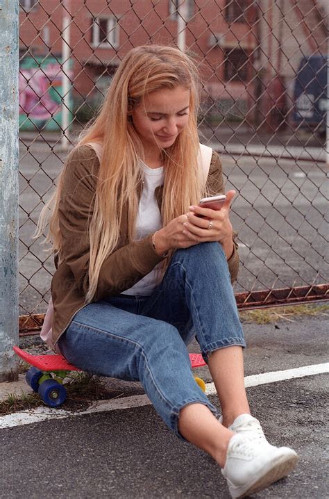 Teen Girl Using Smartphone By Stocksy Contributor Clique Images