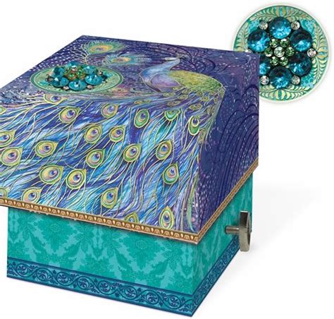 A Decorative Box With Peacocks Painted On It And A Circular Image In