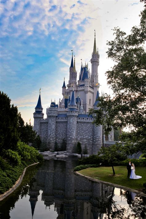 Disney Wedding Couple At Cinderellas Castle Disney World Florida