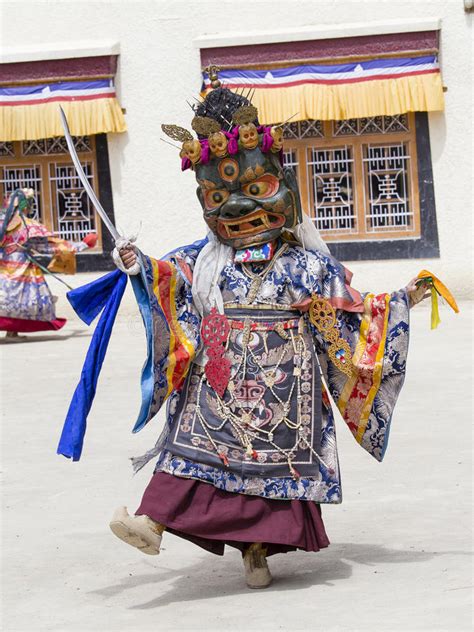 Tibetan Buddhist Lamas Perform A Ritual Dance In The Monastery Of
